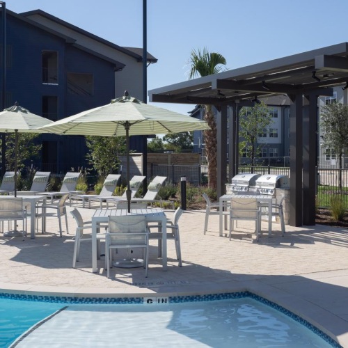 Enjoy our resident-only features pool area with reclining seats and landscaping