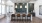 a dining room with a large chandelier and a table with chairs