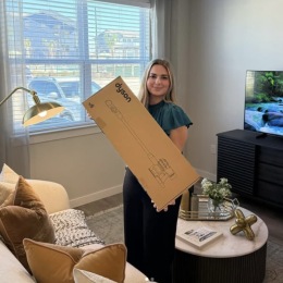 woman holding a box
