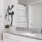 a bathroom with a marble countertop