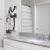 a bathroom with a marble countertop