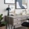 a desk with a chair and a plant on it